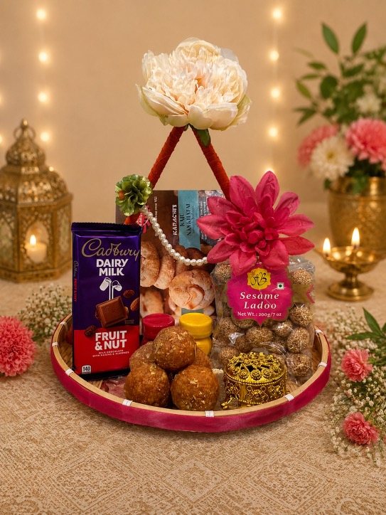 Festival gift basket with sweets, chocolates, and flowers