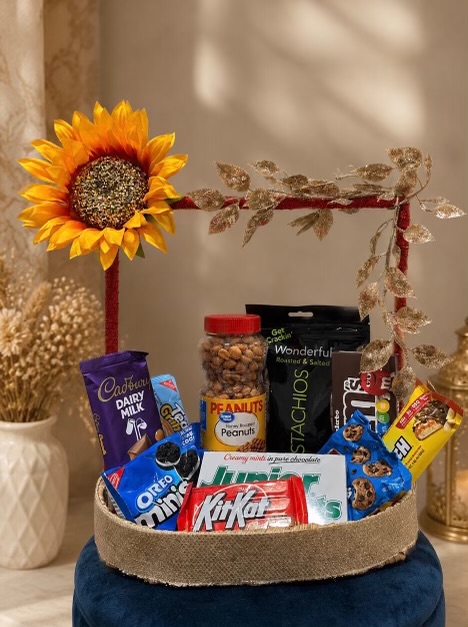 Everyday gift basket with chocolates and snacks