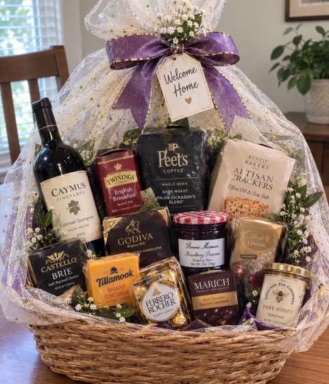 Welcome home gift basket with wine, cheese, and crackers